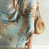 Delmina – Vestido glamoroso com estampa animal