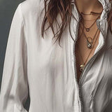 Blusa Branca com Fecho Frontal e Punhos em Folho