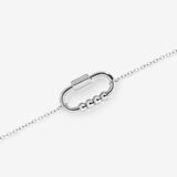 pulseira giratória prateada com 4 contas