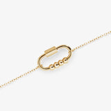 pulseira giratória dourada com 4 contas