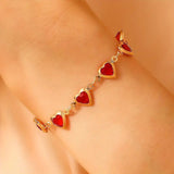Pulseira de Coração Dourada com Rubi