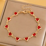 Pulseira de Coração Dourada com Rubi