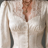 Blusa Romântica Marfim em Jacquard com Gola de Renda Recortada e Efeito Corset