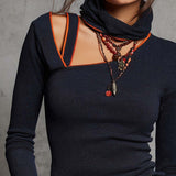 Blusa de Malha Retro com Ombros Assimétricos e Acabamento Contrastante