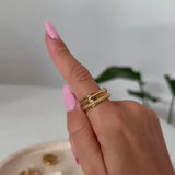 anel giratório dourado em bambu