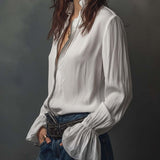 Blusa Branca com Fecho Frontal e Punhos em Folho