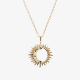 colar dourado com lua giratória