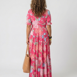 Ione - Vestido floral decote em V