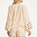 Off White Blouse Met Zwarte Borduursels En Strikkoord | Off White - Black