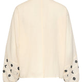 Off White Blouse Met Zwarte Borduursels En Strikkoord | Off White - Black