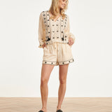 Off White Blouse Met Zwarte Borduursels En Strikkoord | Off White - Black