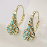 Brincos de flor turquesa banhados a ouro