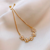 Pulseira em Ouro Branco com Zircónias em Forma de Flor