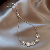 Pulseira em Ouro Branco com Zircónias em Forma de Flor