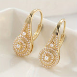 Brincos de flor turquesa banhados a ouro