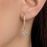 Brincos em Ouro Branco com Moissanite de Corte Redondo
