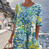 Chérie | Vestido midi floral solto e leve